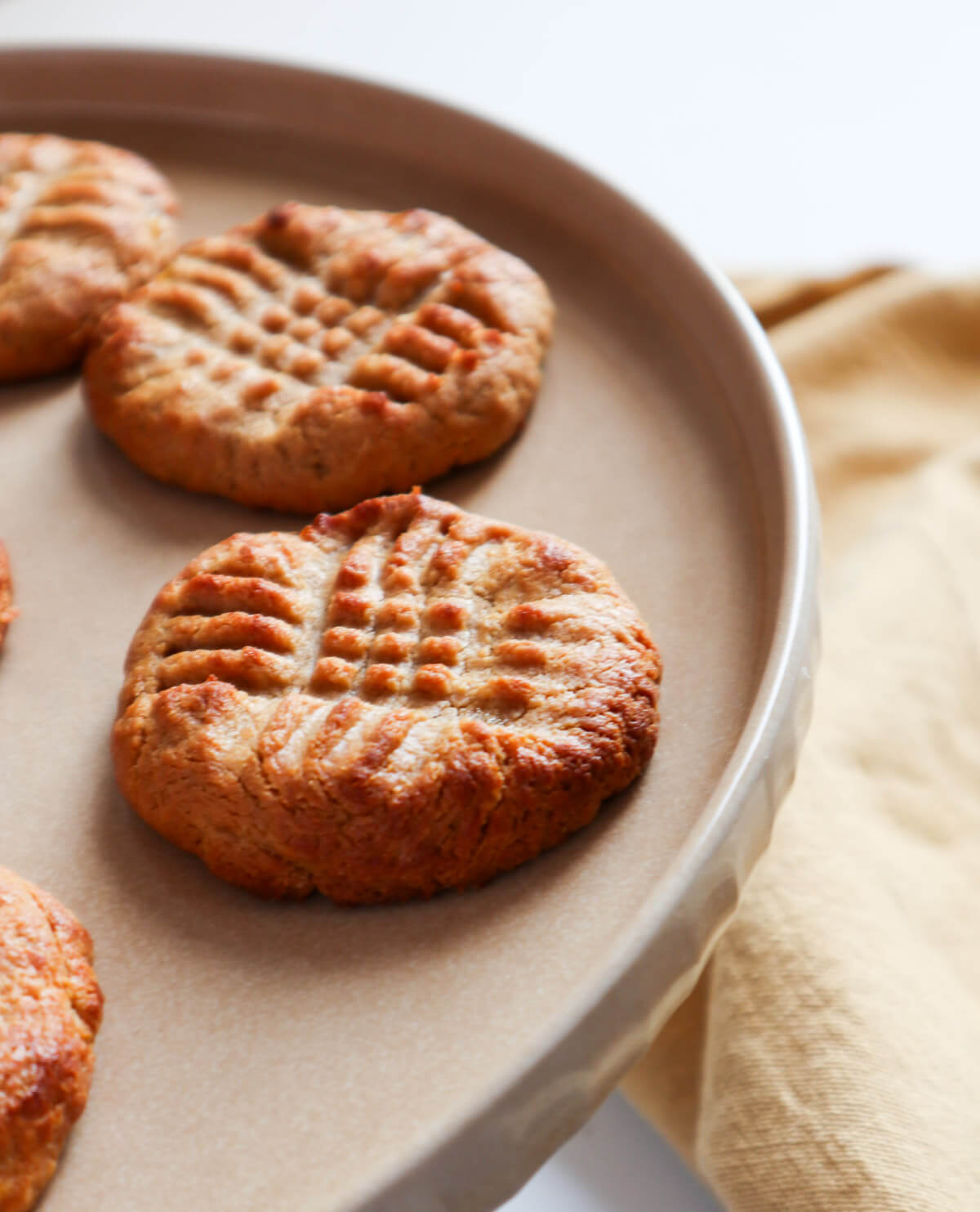 Baked peanut butter cookies on grey plate